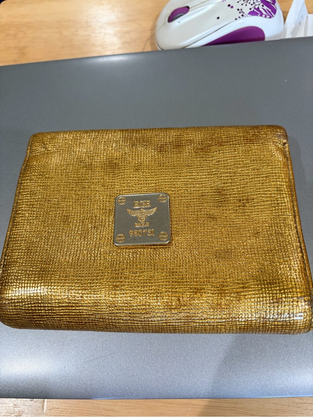 MCM metallic gold textured leather wallet